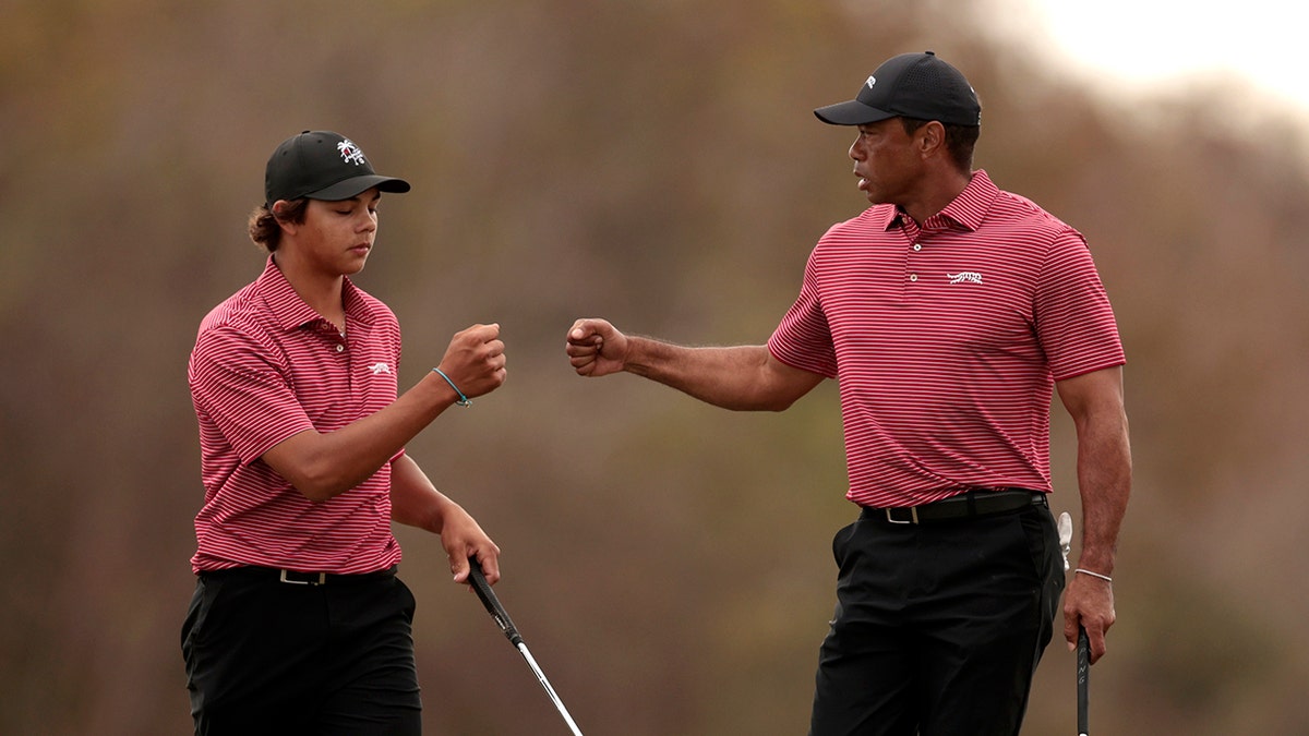 Charlie y Tiger Woods