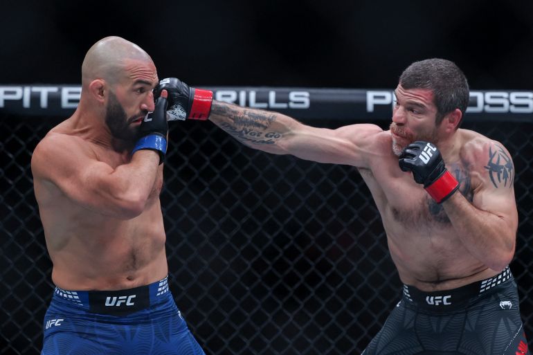 NEWARK, NUEVA JERSEY – 9 DE MAYO: El estadounidense Jim Miller (R) golpea al estadounidense Jared Gordon durante UFC 328 en el Prudential Center el 9 de mayo de 2026 en Newark, Nueva Jersey. Ishika Samant/Getty Images/AFP (Foto de Ishika Samant/GETTY IMAGES NORTEAMÉRICA/AFP vía Getty Images)
